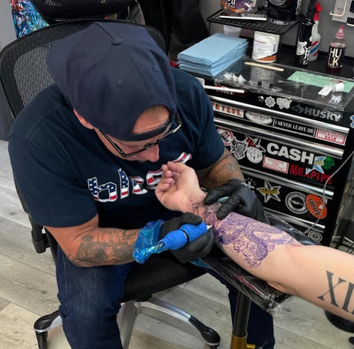 Explore book tattoo ideas for females, creative tattoo ideas in San Diego, available at Saints And Sinners Tattoo Shop