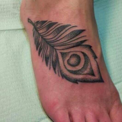 Explore disco elysium tattoo ideas, creative tattoo ideas in Asheboro, available at Blue Luna Tattoo Company, LLC