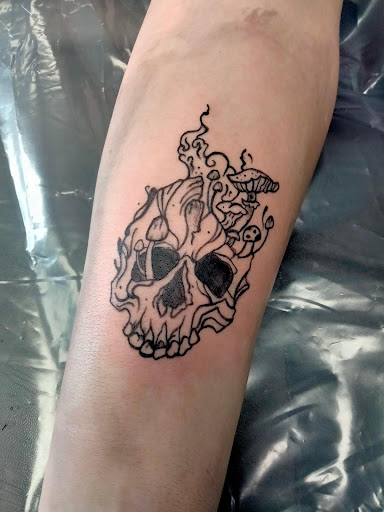 Explore guy side tattoo ideas, creative tattoo ideas in Lake City, available at Crooked Spines Tattoo Studio