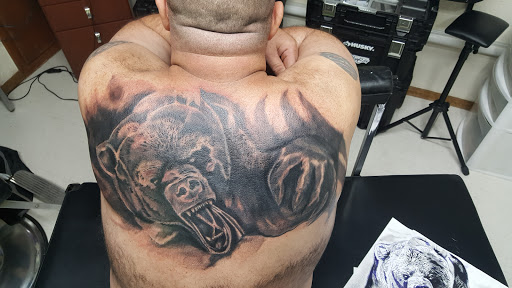 Explore small face tattoo ideas, creative tattoo ideas in Spencer, available at Ink Envy Tattoo And Body Piercing