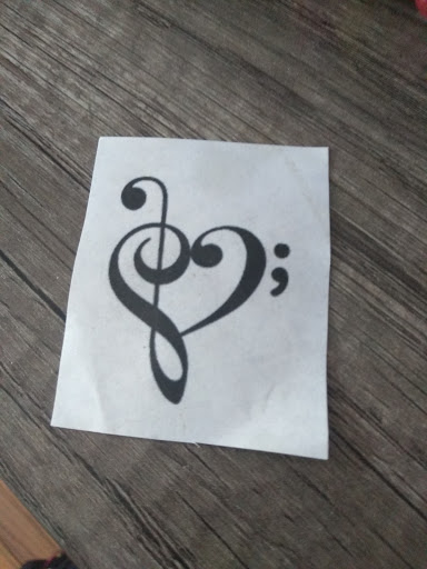 Explore joker hand tattoo ideas, creative tattoo ideas in Xenia, available at Totem Gallery