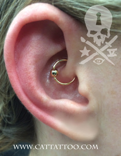 Explore red tattoo ideas, creative tattoo ideas in Addison, available at Cat Tattoo