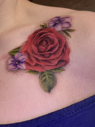 Explore womens sternum tattoo ideas, creative tattoo ideas in Liberty, available at Yahweh Approved Tattoos and Piercings