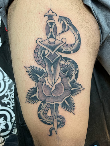 Explore cool leg tattoo ideas, creative tattoo ideas in Milwaukee, available at MANIA Tattoos Milwaukee