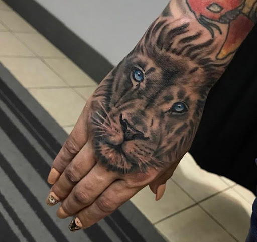 Explore viking hand tattoo ideas, creative tattoo ideas in Elizabeth, available at Divine Light Tattoos