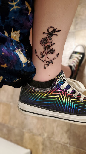 Find dog tattoo idea for your next unique tattoo in Myrtle Beach at Elite Ink Tattoos of Myrtle Beach