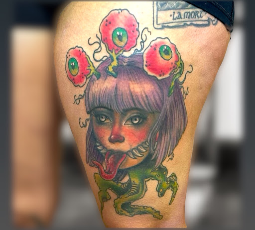 Explore art deco tattoo ideas, creative tattoo ideas in Marietta, available at The Queen Bee Tattoo and Piercing Parlour