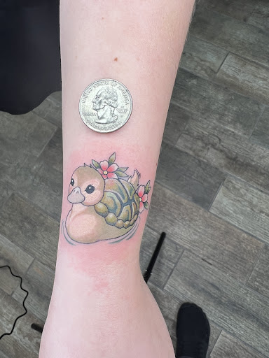 Explore ankle tattoo cover up ideas, creative tattoo ideas in Buford, available at Wild Tribe Tattoos and Piercings