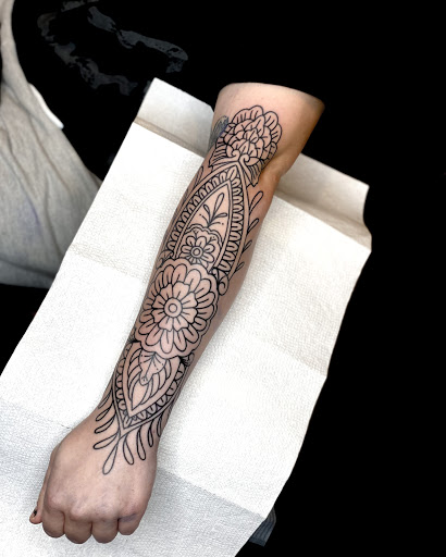Explore tattoo collarbone ideas, creative tattoo ideas in Elkview, available at Andy Electric Tattoos