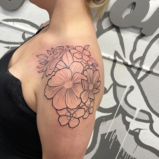 Explore michigan football tattoo ideas, creative tattoo ideas in Zumbrota, available at Art by Sinclair Tattoo Artist At Dry Bones Ink