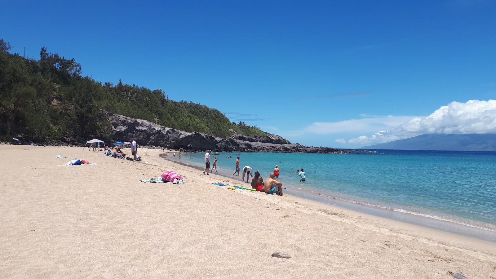 Foto di Slaughterhouse Beach con una superficie del acqua cristallina