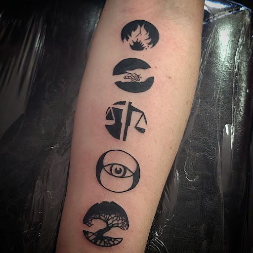 Explore small forget me not tattoo ideas, creative tattoo ideas in Garden Grove, available at Dr. Tattoo Studio