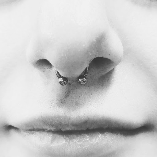 Explore haunted house tattoo ideas, creative tattoo ideas in Three Rivers, available at Portfolio Ink, LLC