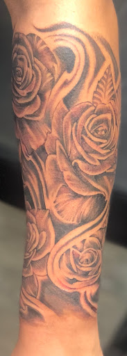 Find between the breast tattoo ideas for your next unique tattoo in Springfield at InkI.Adore