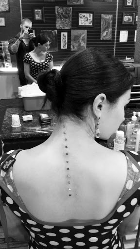 Explore belle tattoo ideas, creative tattoo ideas in Tucson, available at Sacred Art Tattoo Studio