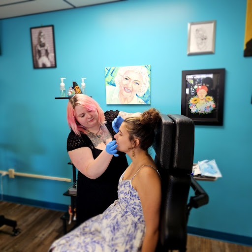 Explore cute woman tattoo ideas, creative tattoo ideas in Traverse City, available at Pinups & Needles