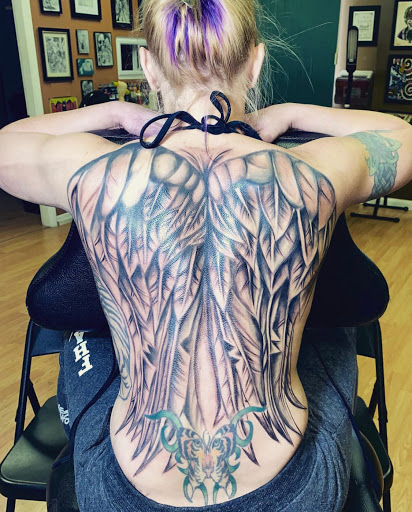 Find forearm tattoo ideas for your next unique tattoo in Harrisville at Cloud 9 Tattoo Company