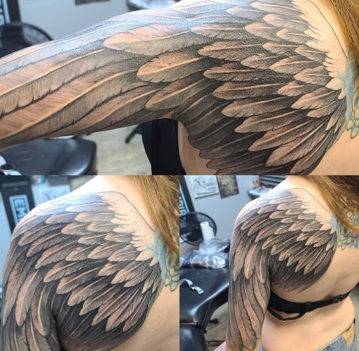Find cardinal tattoo ideas for ladies for your next unique tattoo in Kenosha at Kenosha Tattoo Company
