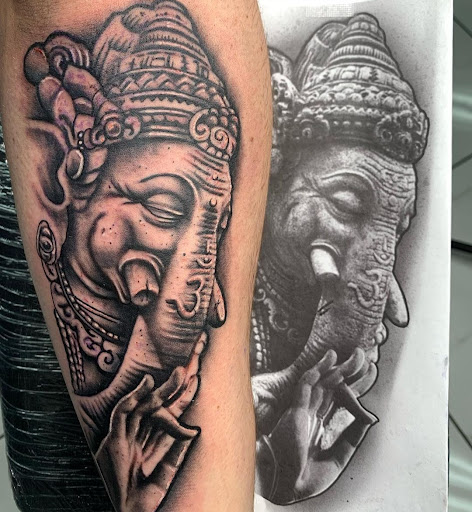 Explore trap tattoo ideas, creative tattoo ideas in Fountain, available at United Tattoo