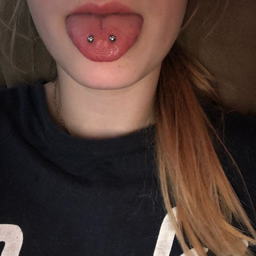 Explore leap year tattoo ideas, creative tattoo ideas in Elko, available at Custom Tattoos and Body Piercing Studio