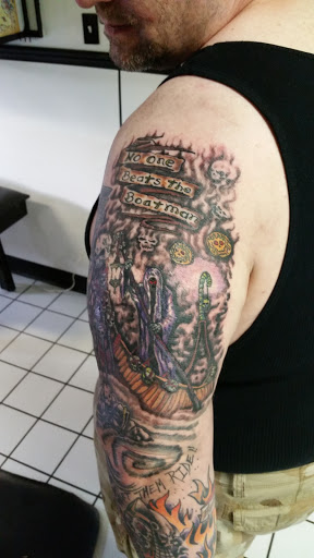 Explore skull and roses tattoo ideas, creative tattoo ideas in Erie, available at EliKingInk