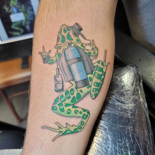Explore last name back tattoo ideas, creative tattoo ideas in Easley, available at Peach Pit Tattoo