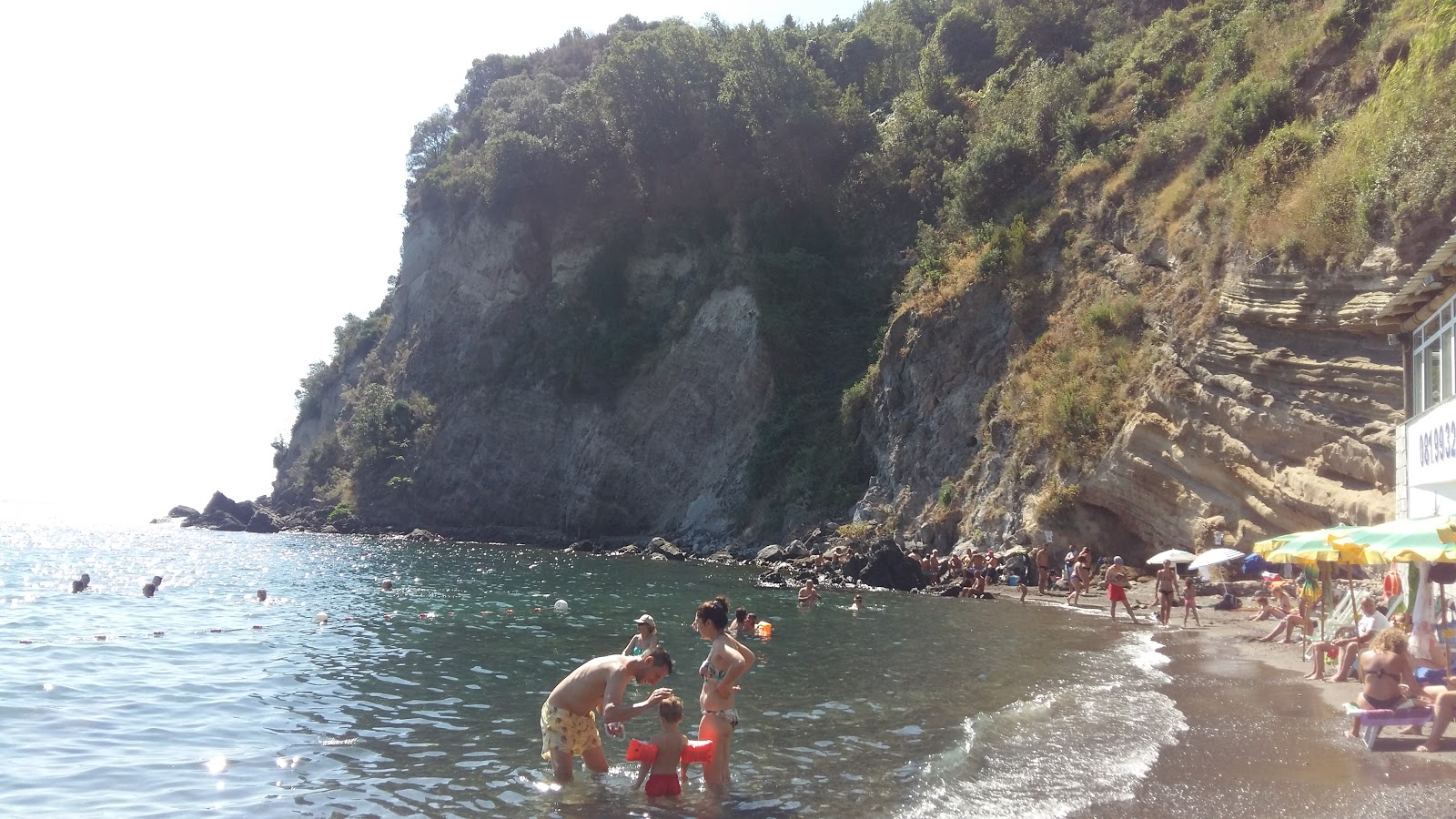 Foto van Spiaggia di Cartaromana en de nederzetting