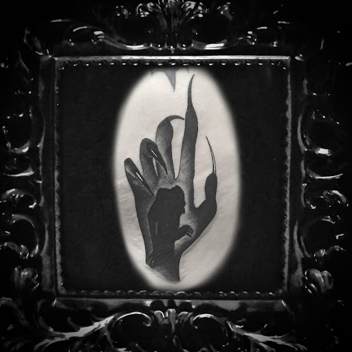 Explore apple tattoo ideas, creative tattoo ideas in Venice, available at The Beehive Tattoo Studio and Boutique