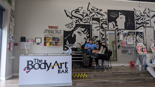 Explore women's thigh tattoo ideas, creative tattoo ideas in Berwyn, available at The Body Art Bar