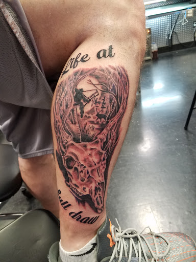 Explore minimalist tattoo ideas with meaning, creative tattoo ideas in Hilliard, available at 22 Caliber Tattoo Mega Studio