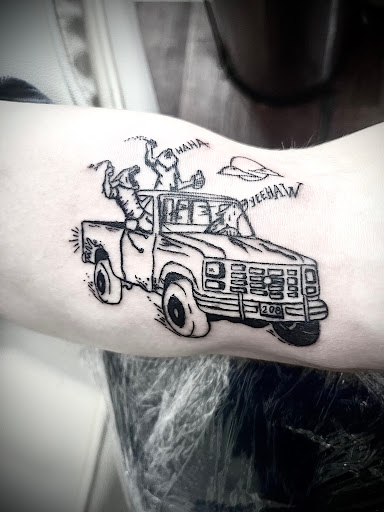 Explore mens upper back tattoo ideas, creative tattoo ideas in Rogers, available at Ink Solutions Tattoo