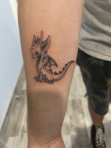 Explore santa tattoo ideas, creative tattoo ideas in Jacksonville, available at East Coast Worldwide Tattoo & Piercing