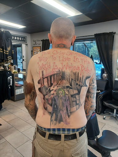 Explore men back tattoo ideas, creative tattoo ideas in Edison, available at Rorschach Gallery