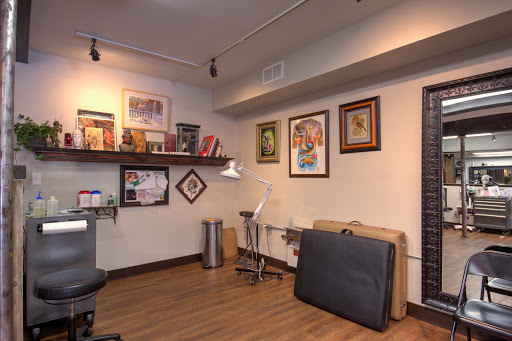 Explore mens back tattoo idea, creative tattoo ideas in Fort Collins, available at Tribal Rites Tattoo & Piercing