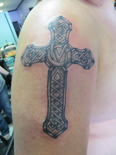 Explore armor tattoo ideas, creative tattoo ideas in Powell, available at AVALON COVE TATTOO