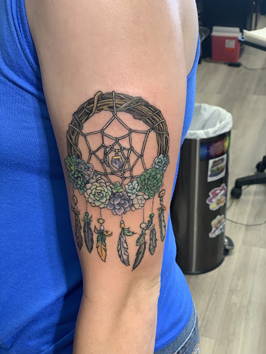 Explore compass tattoo ideas, creative tattoo ideas in Youngstown, available at Twisted Metal Custom Body Art