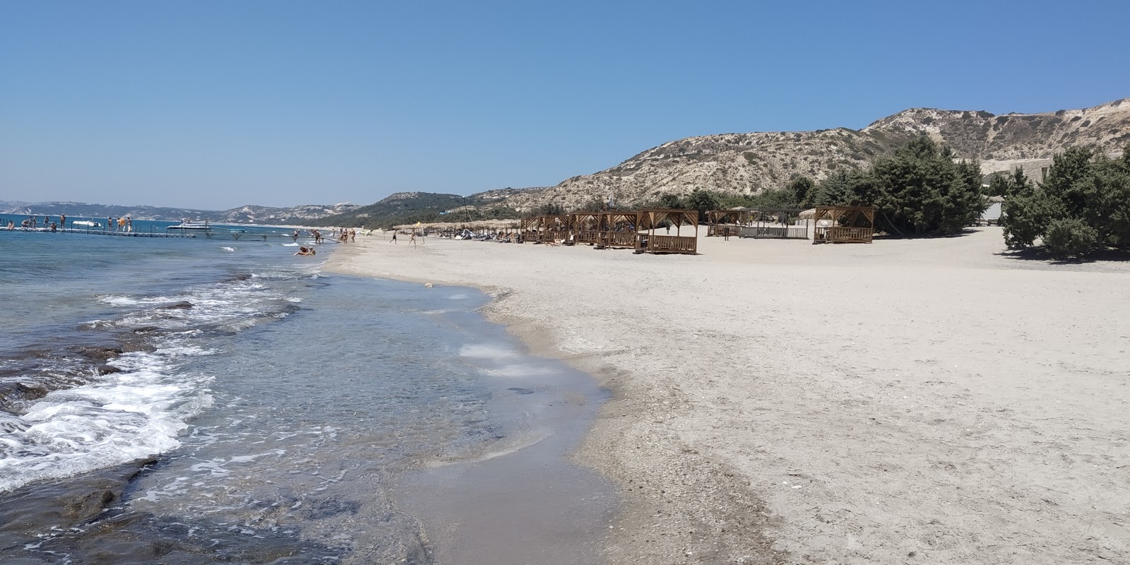 Foto de Blue Lagoon Beach con arena beige superficie