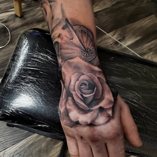 Explore mens behind the ear tattoo ideas, creative tattoo ideas in Whitehall, available at Legion Tattoo Gallery