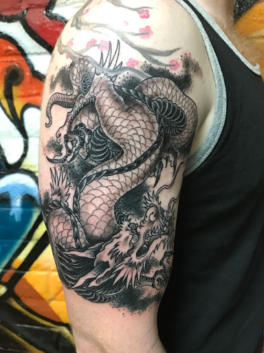 Explore massage therapy tattoo ideas, creative tattoo ideas in Glendale, available at Chosen Art Tattoo