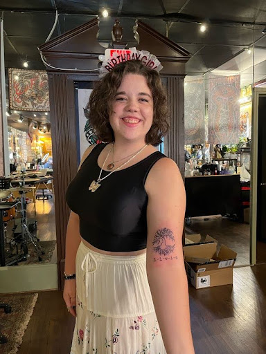 Explore feminine neck tattoo ideas, creative tattoo ideas in Johnson City, available at Gold Cross Tattoo Co.