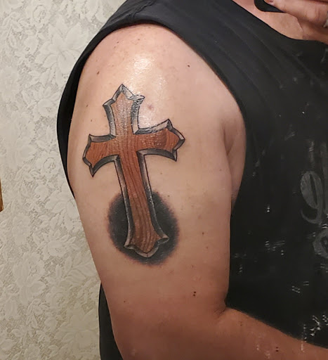 Explore mens cross tattoo ideas, creative tattoo ideas in Terre Haute, available at Under the Gun Inc