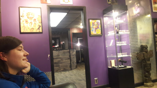 Find tattoo wedding band ideas for your next unique tattoo in Vincennes at Altered Image