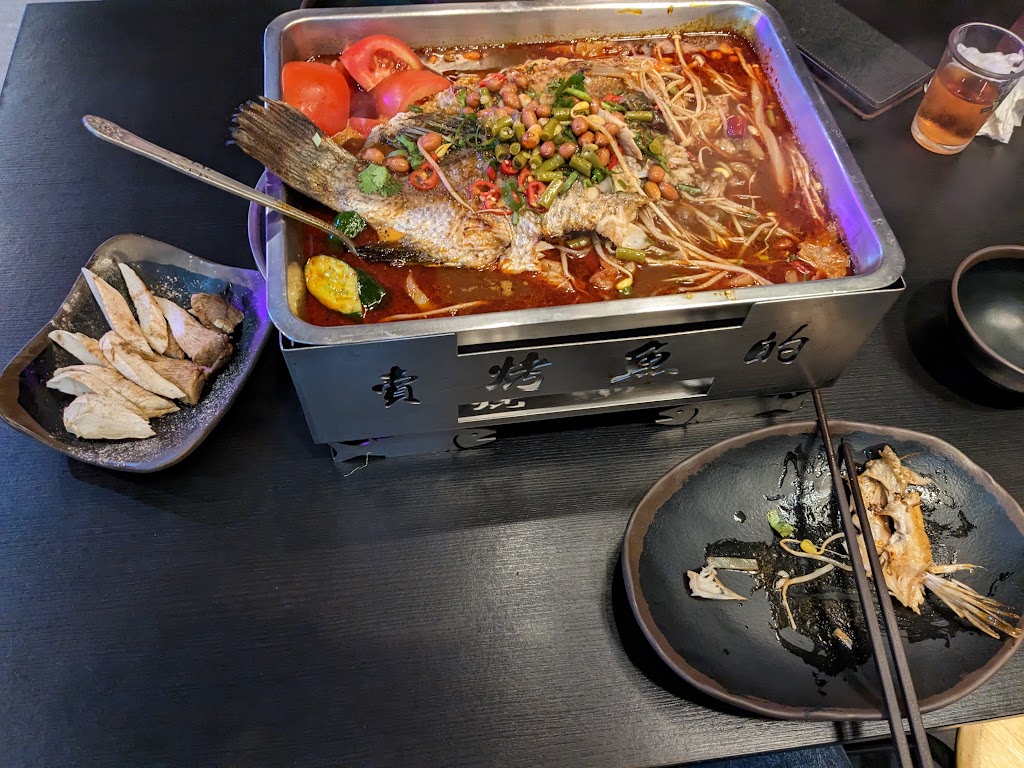 賣烤魚的。 的照片