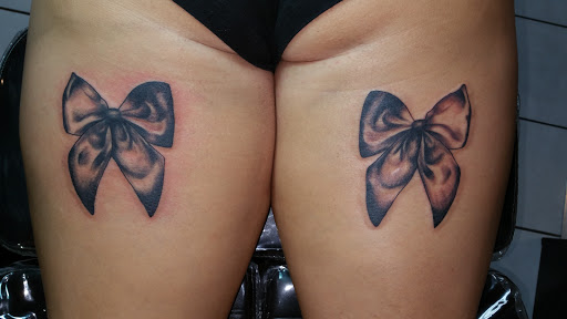 Explore tattoo face ideas, creative tattoo ideas in Foley, available at Black Sheep Custom Tattoos and Piercings