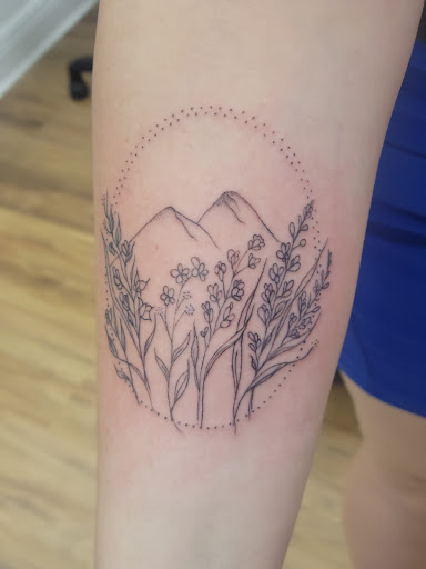 Explore arm cross tattoo ideas, creative tattoo ideas in Sarasota, available at Diamond Reigns Tattoos