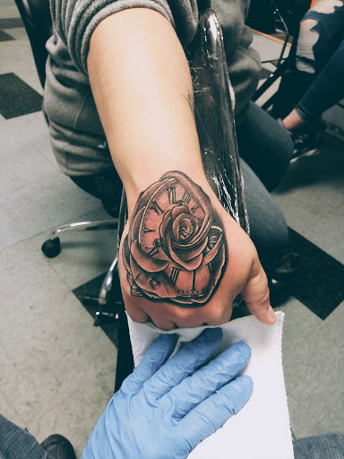 Explore axe tattoo ideas, creative tattoo ideas in Columbus, available at Timeless Ink Tattoos