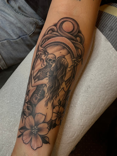 Explore small dog tattoo ideas, creative tattoo ideas in Fayetteville, available at Sovereign Tattoo Studio