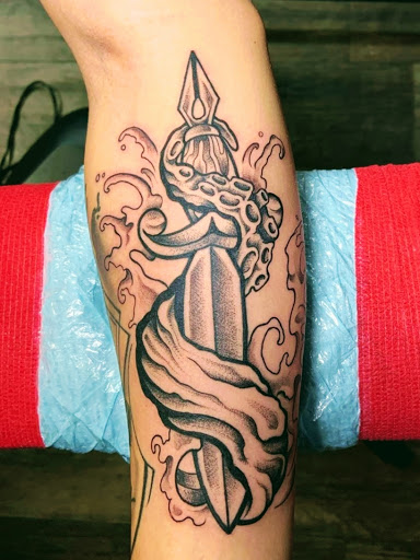 Explore auto mechanic tattoo ideas, creative tattoo ideas in Clermont, available at Absolute Tattoo & Piercing Clermont Fl.