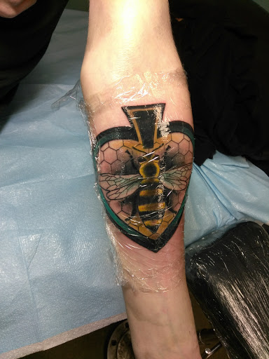 Explore safari tattoo ideas, creative tattoo ideas in Artesia, available at Black Tie Affair Tattoo Parlor