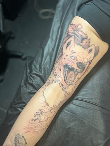 Explore cool neck tattoo ideas, creative tattoo ideas in Rogers, available at Red Fern Tattoo